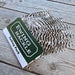 Ewing Tailing Pack - Grizzly dry fly tailing feathers